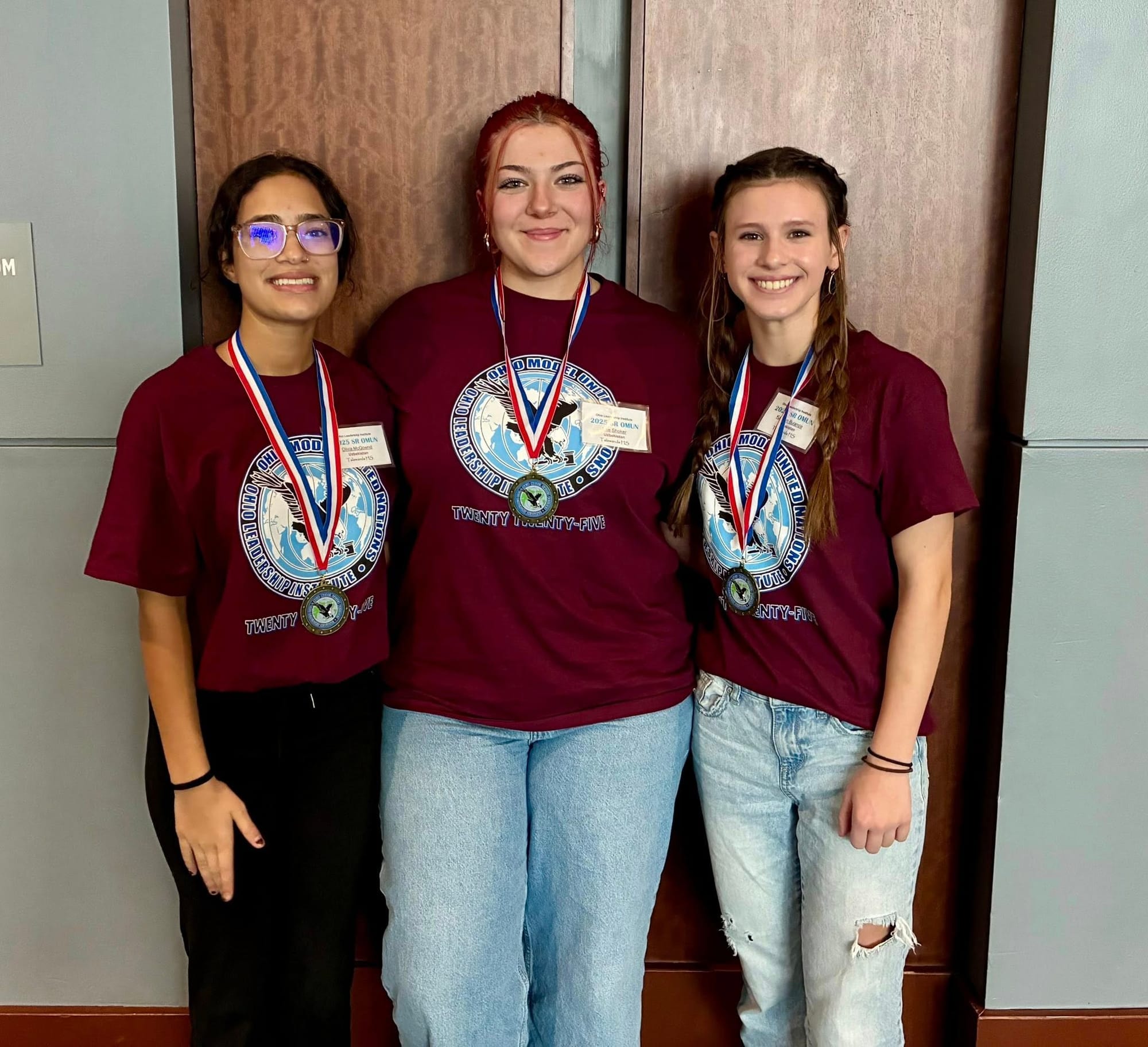 President of Talawanda High School’s Model UN team, Olivia McDownd, left, poses with team vice president Ellie Shoker and team treasurer Katelyn Bulanda