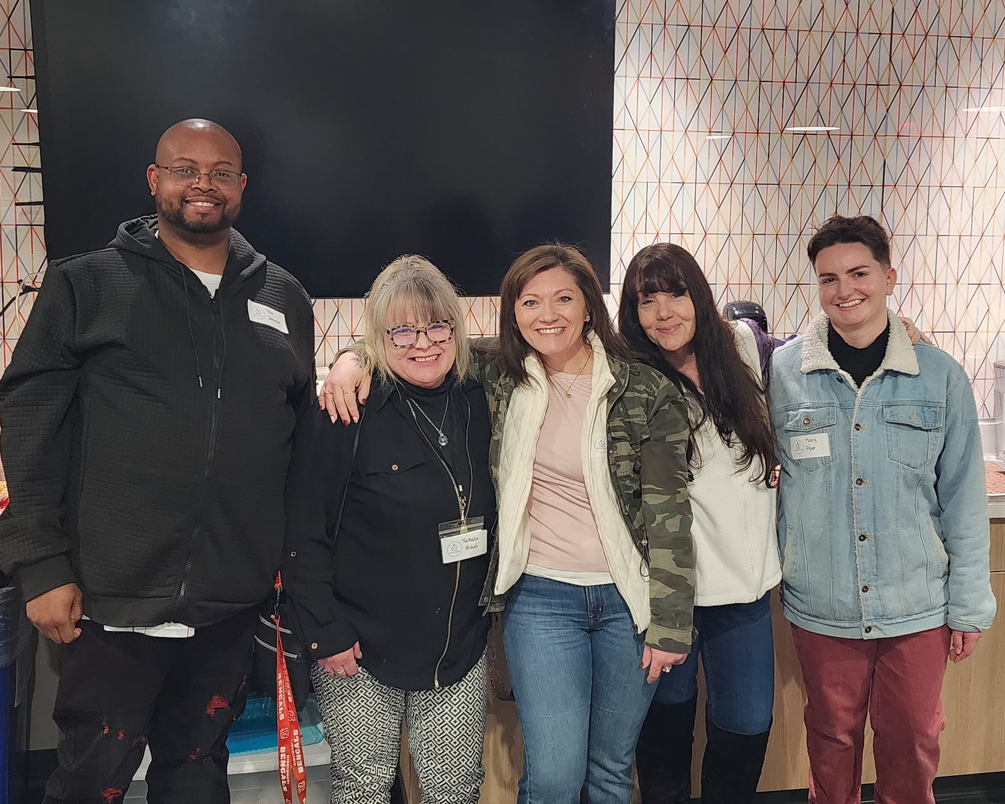 Oxford Winter House staff for the 2025-26 season pose for a photo during a celebratory dinner on March 2, 2026.