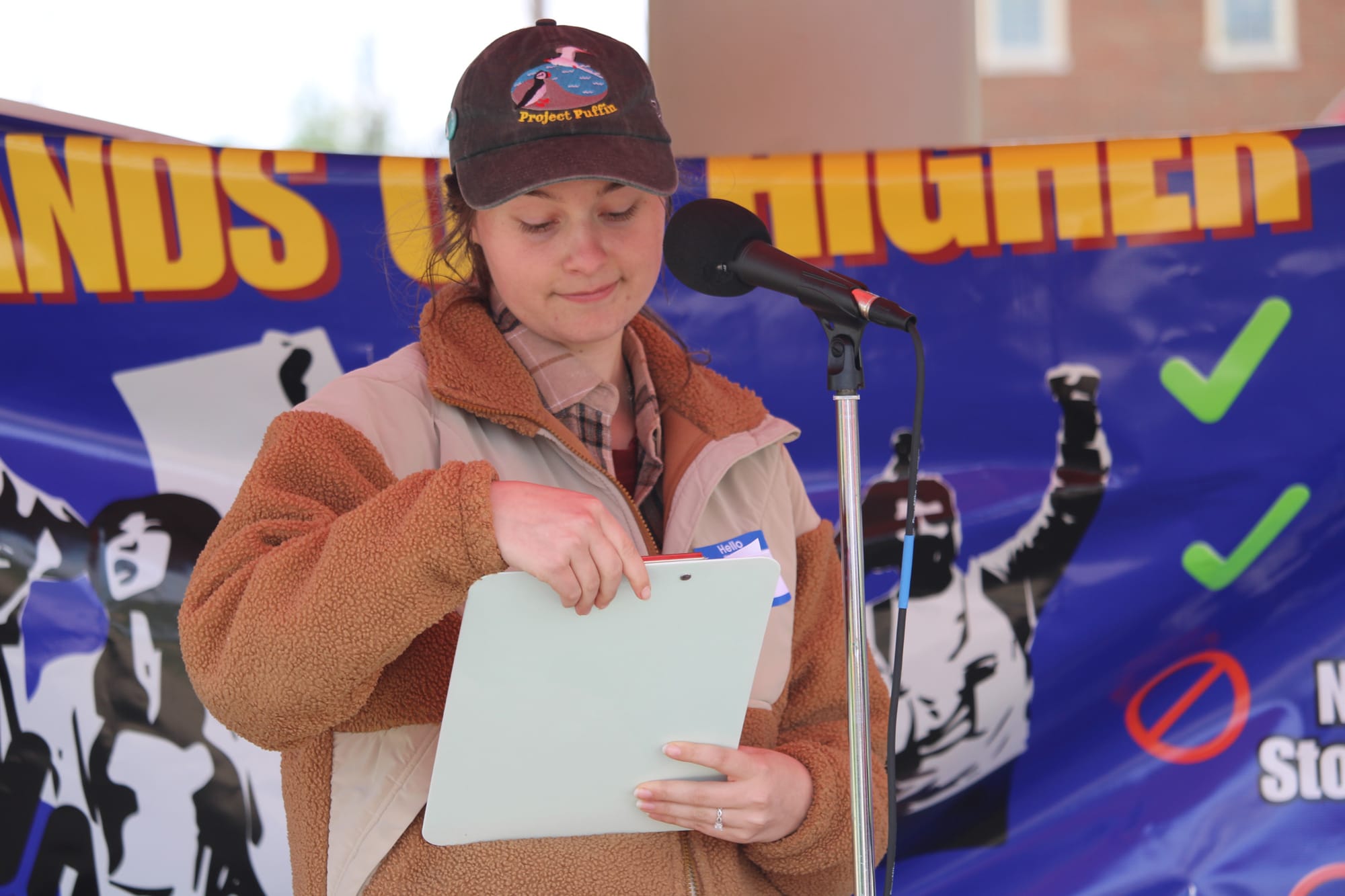 Michelle Baker speaks about the potential environmental harms of building an arena during a protest