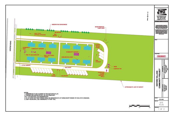 A map showing a rectangular plot of land in green with 12 blue houses on it, surrounded by a U-shaped road