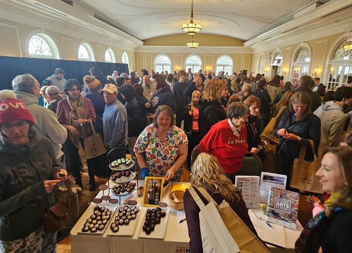 Residents fill hte ball room at the OCAC to buy chocolate