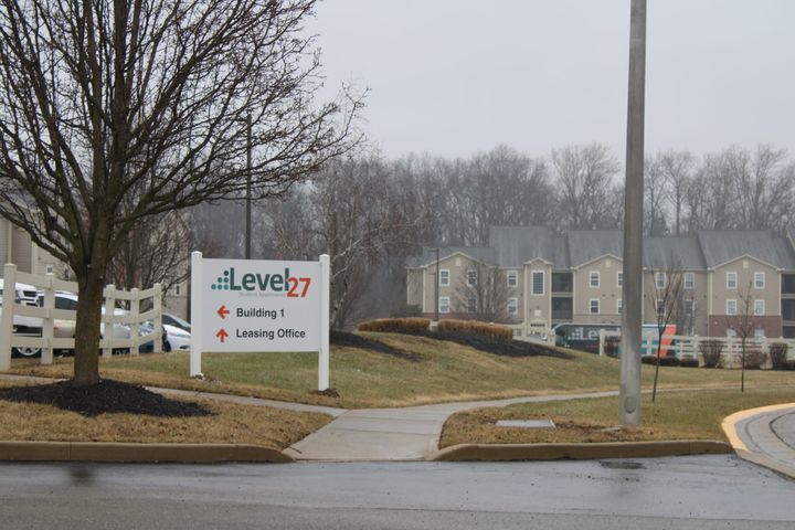 A Level 27 sign in front of student apartments