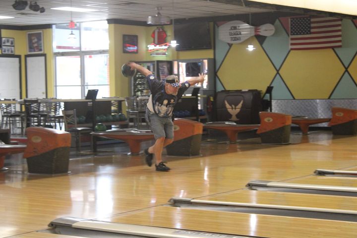 A man prepares to send his bowling ball down a lane at Oxford Lanes.