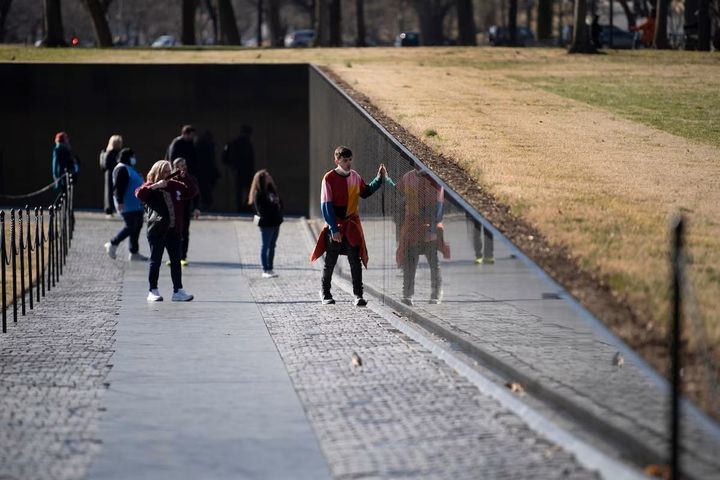 The Vietnam Veterans Memorial Wall in Washington, D.C. lists the names of thousands of American soldiers who lost their lives in the Vietnam War.