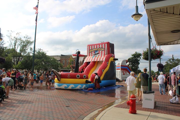 The "Beach Staycation: Pirate Invasion" event included water slides and slip n' slides.