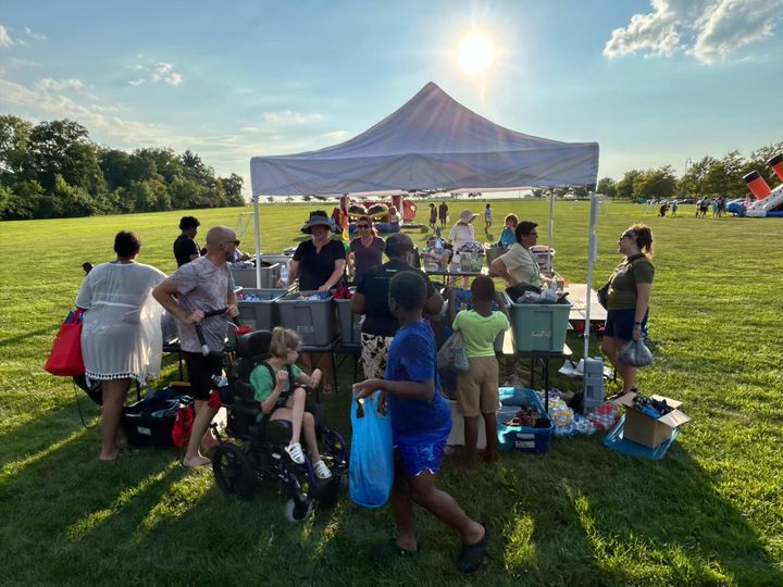 Thread Up attends the Back to School Bash, featuring Shana Rosenberg and volunteers.