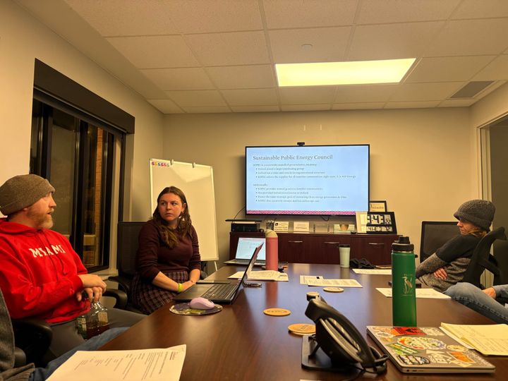 Oxford Environmental Commission Chair Jason Bracken explains how renewable energy credits work to environmental commission members