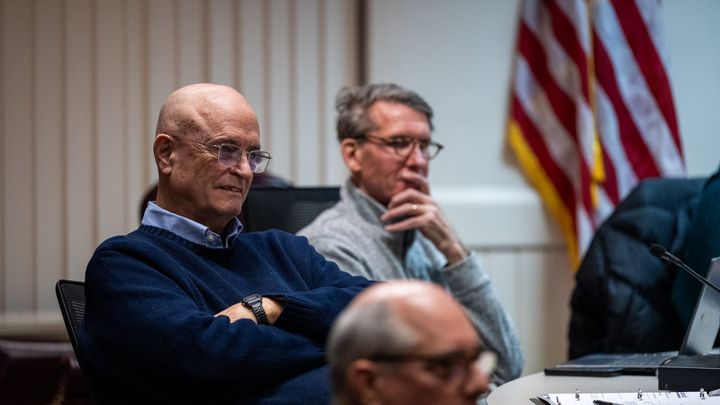Councilors Bill Snavely (left) and Jim Vinch listen during public comment at the Oxford City Council meeting on Feb. 3, 2026.