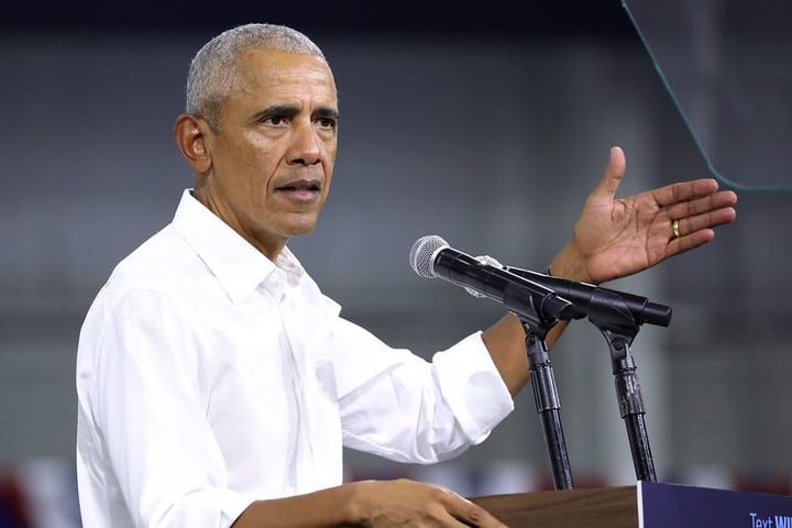 Former President of the United States Barack Obama speaking with supporters at a campaign rally for Vice President Kamala Harris