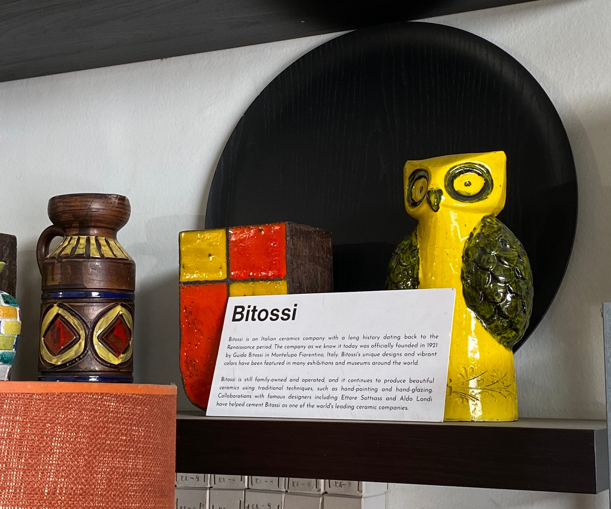 Bitossi owl and vases on a shelf.