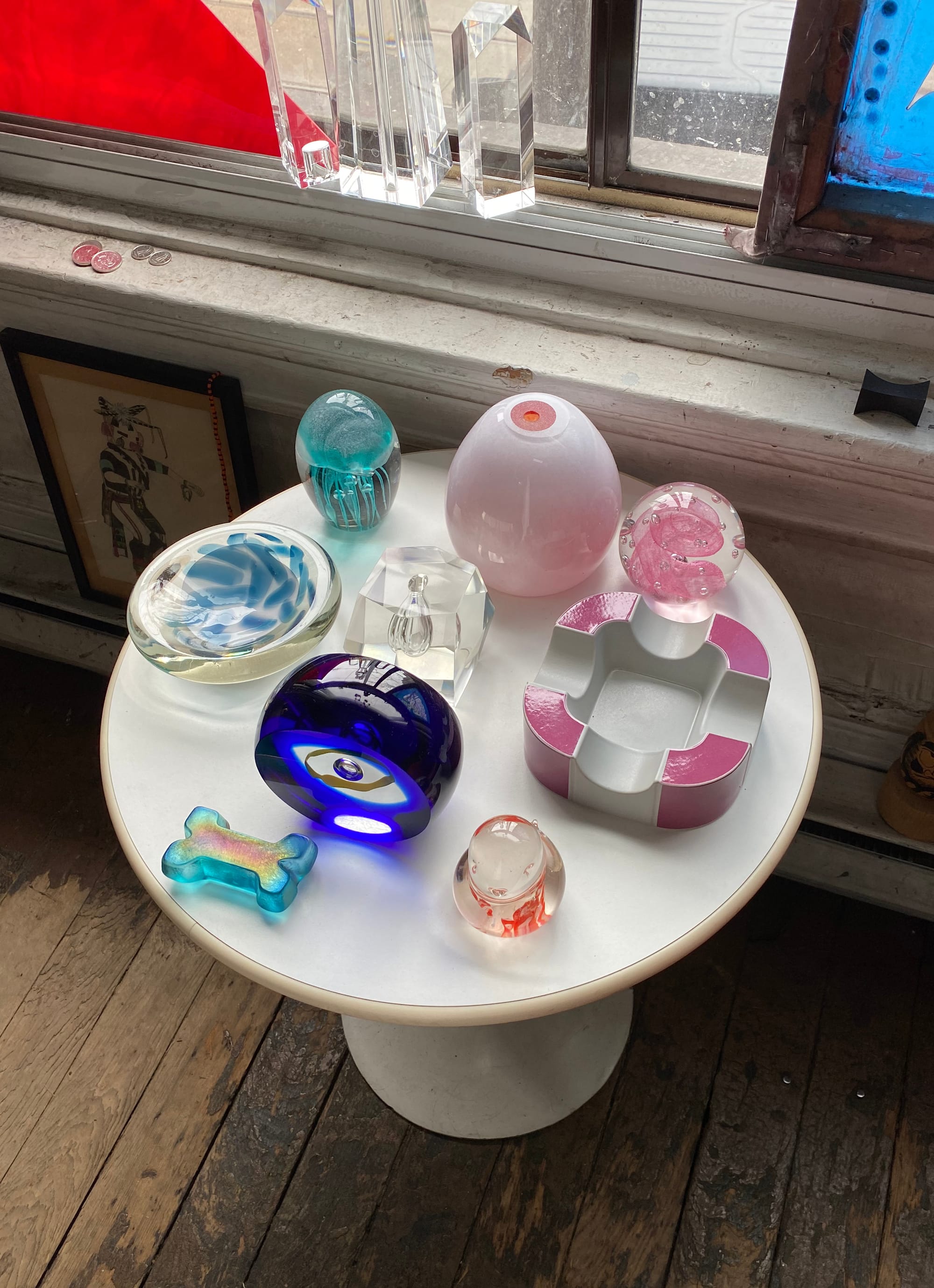 Assorted vintage objects on a white tabletop.