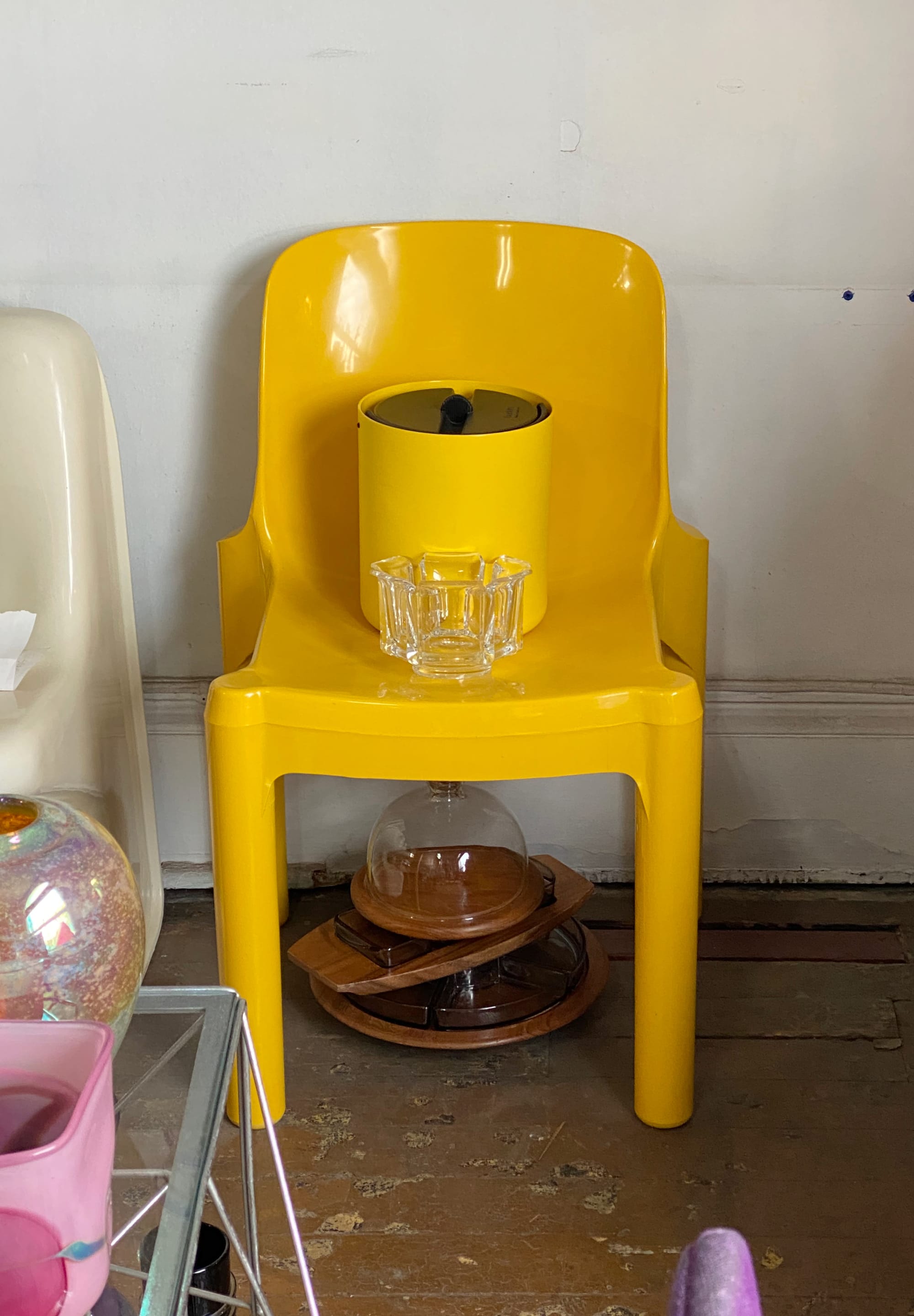 Bright yellow plastic chair.