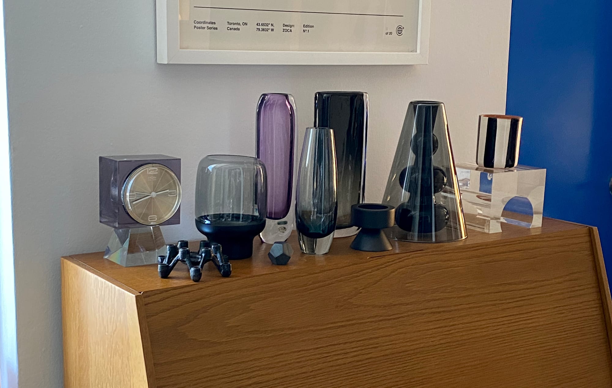 Collection of glass and Lucite pieces on the top of my desk.