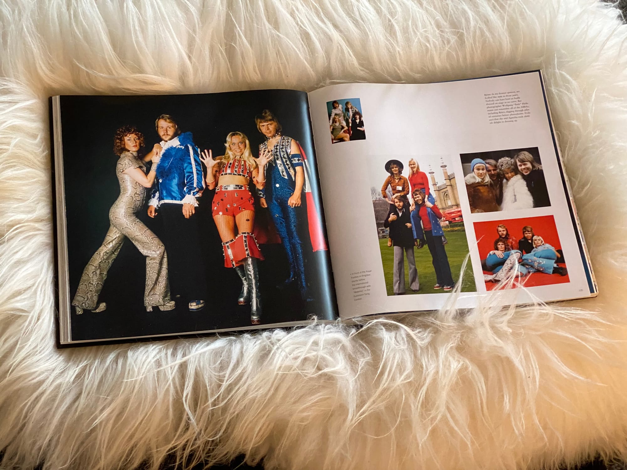 Open ABBA book on a sheepskin throw.