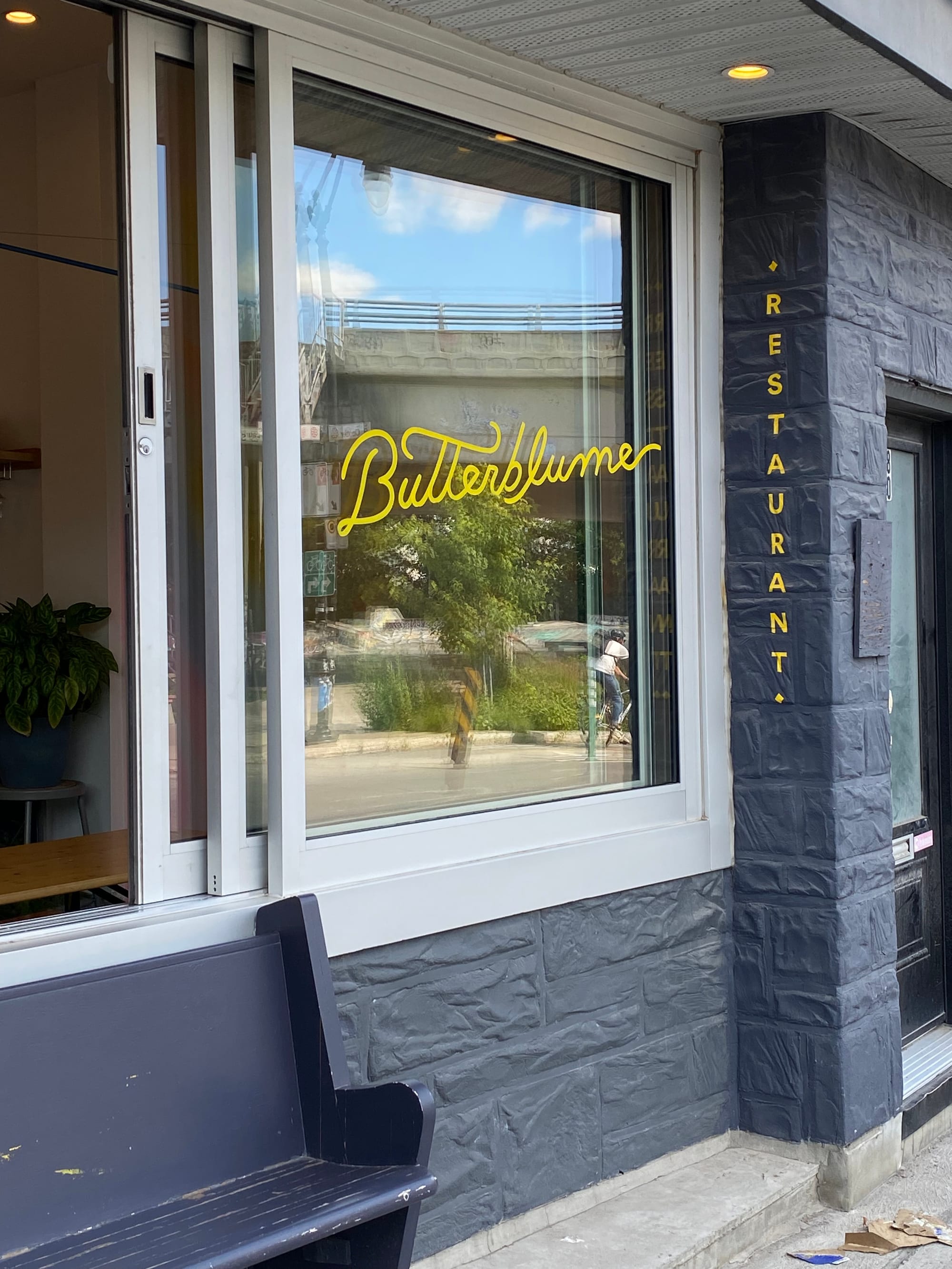 The facade of Butterblume, showing the restaurant name on the window.