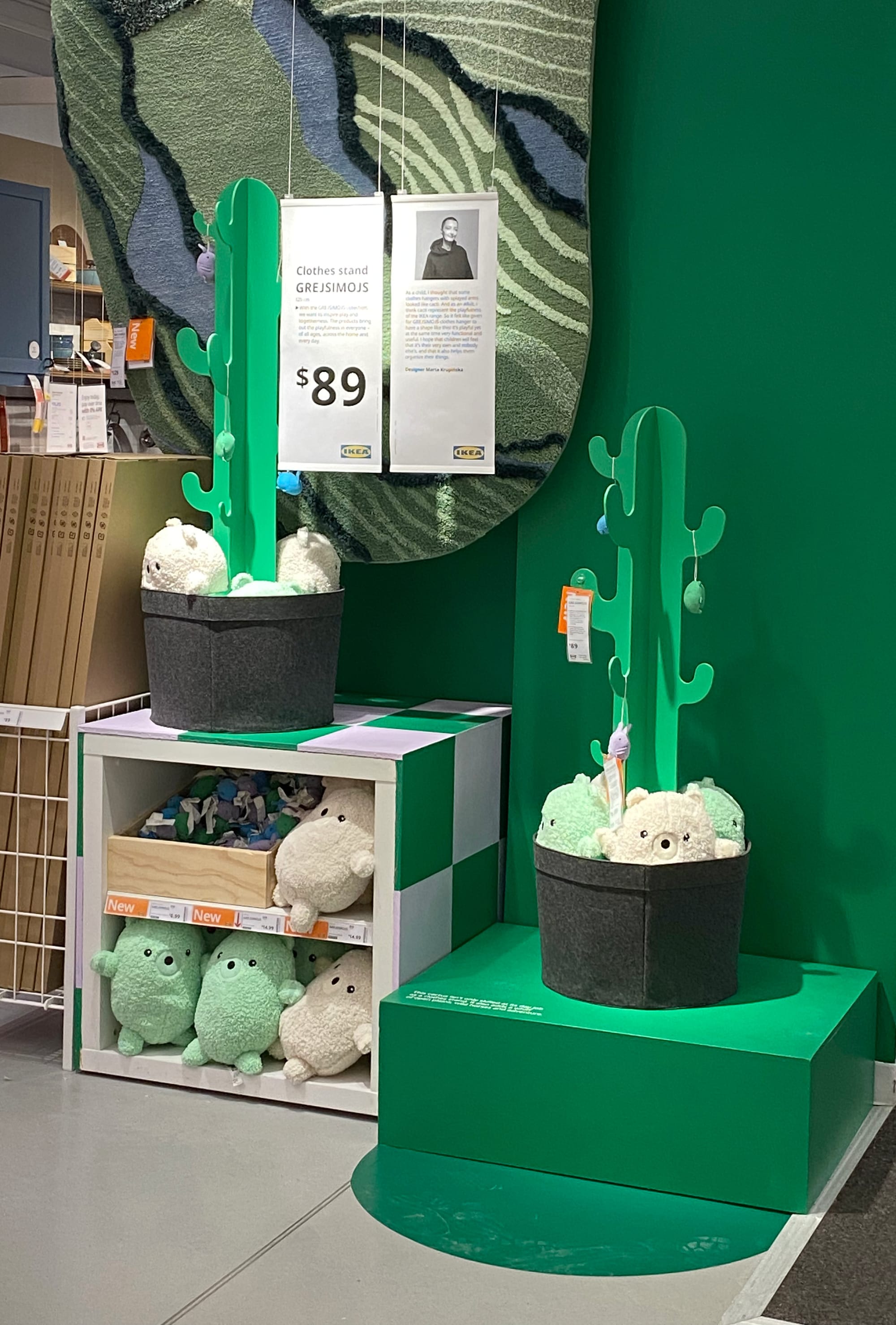 Topographical carpet and cactus clothing trees.
