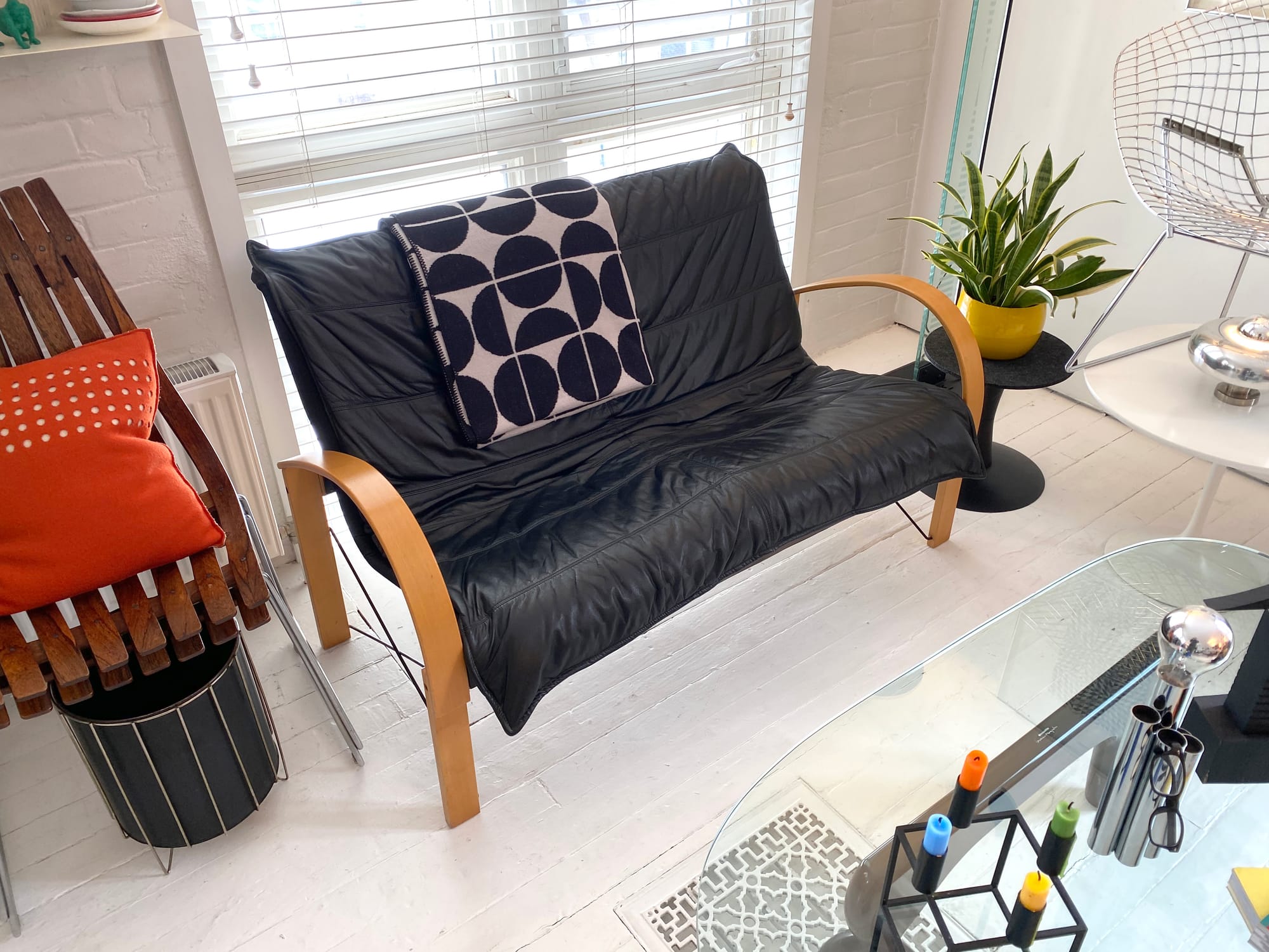 A black leather POLEM sofa from IKEA.