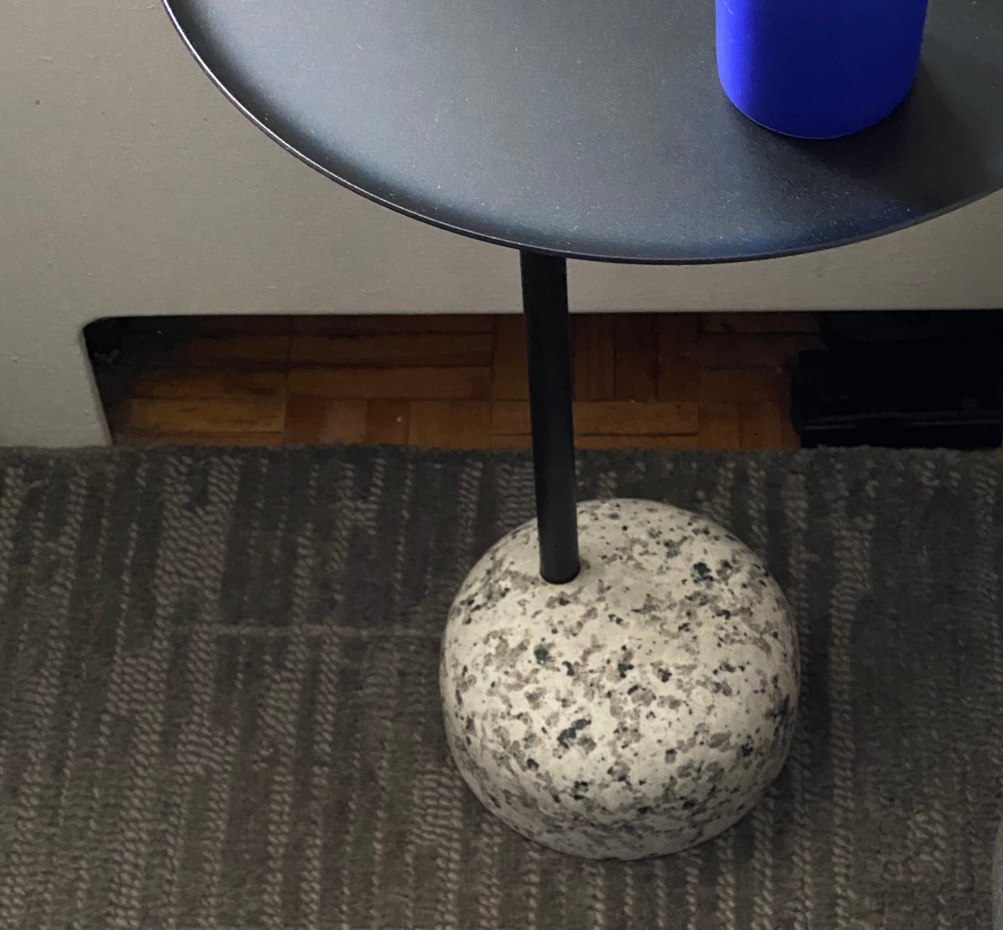 Closer shot of Bowler side table emphasizing the heavy base.