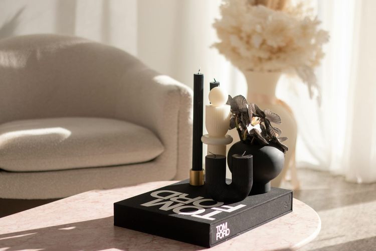 Tom Ford book with decorative objects on top.