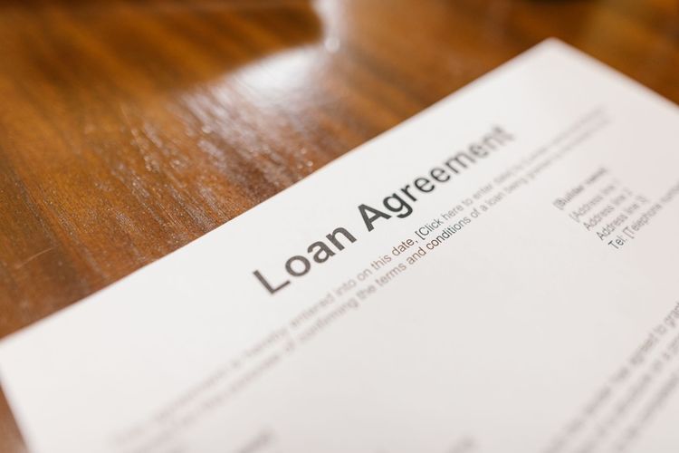 Close-up of a pre-approval letter showing loan amount and terms