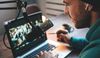 Different Marketing Activities for Your Law Firm - host streaming his audio podcast using microphone and laptop at his homema