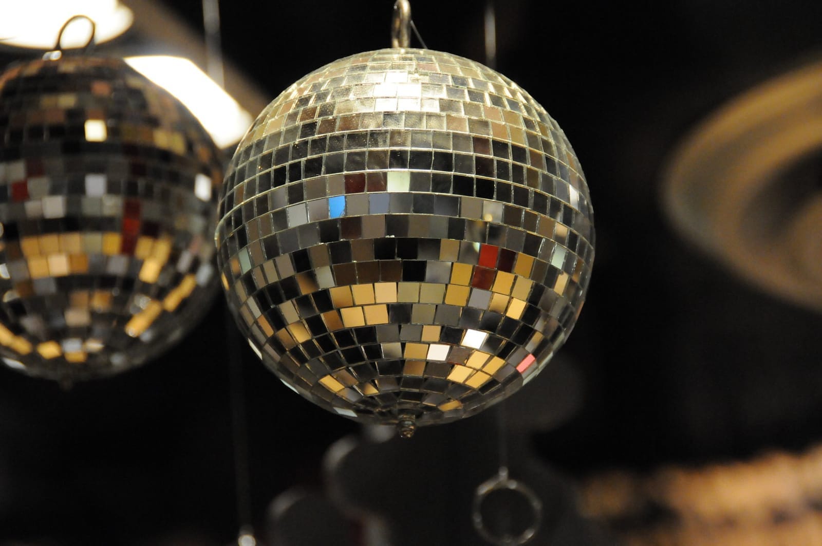 Photo showing multiple disco balls.