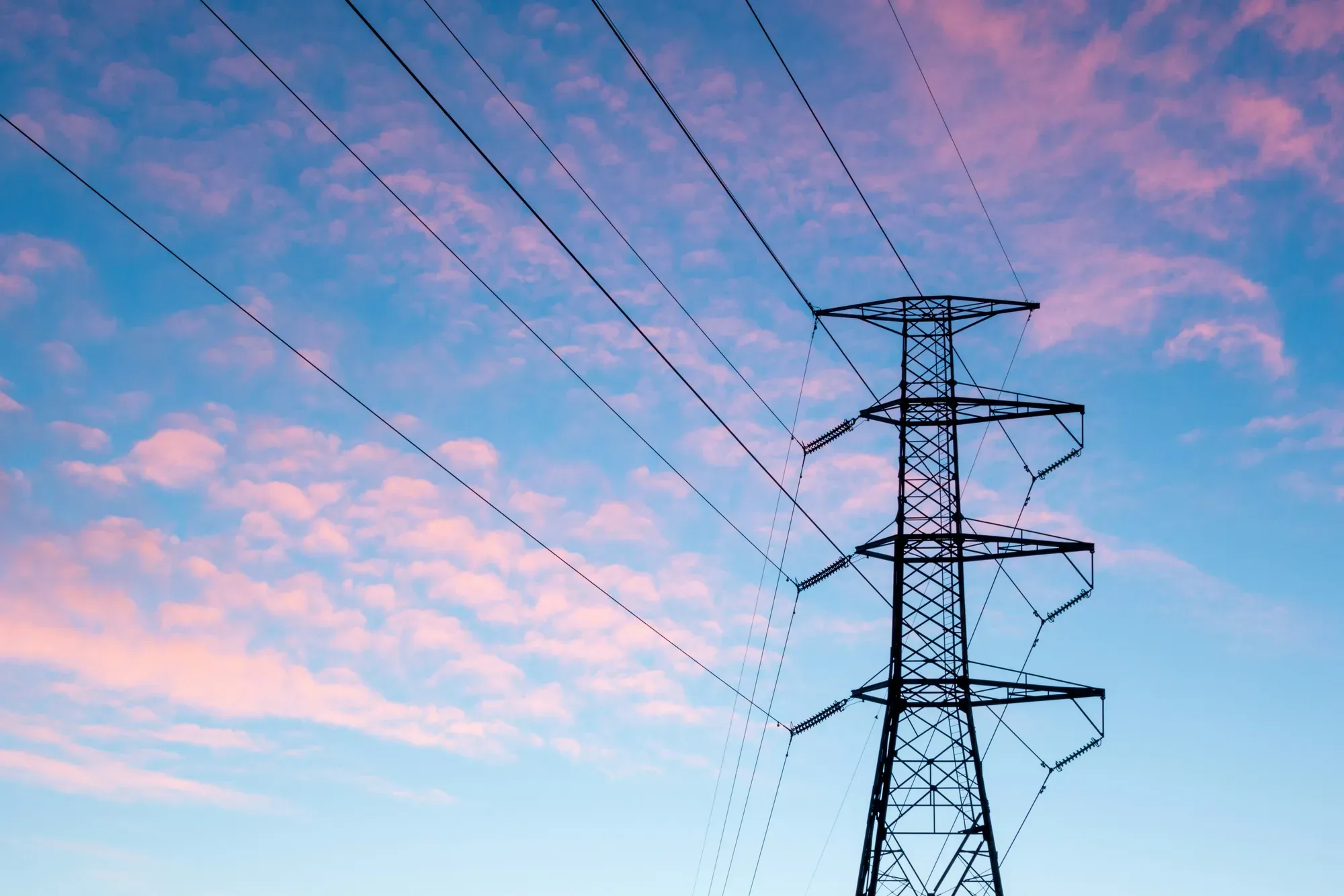 A view of power lines against the sky