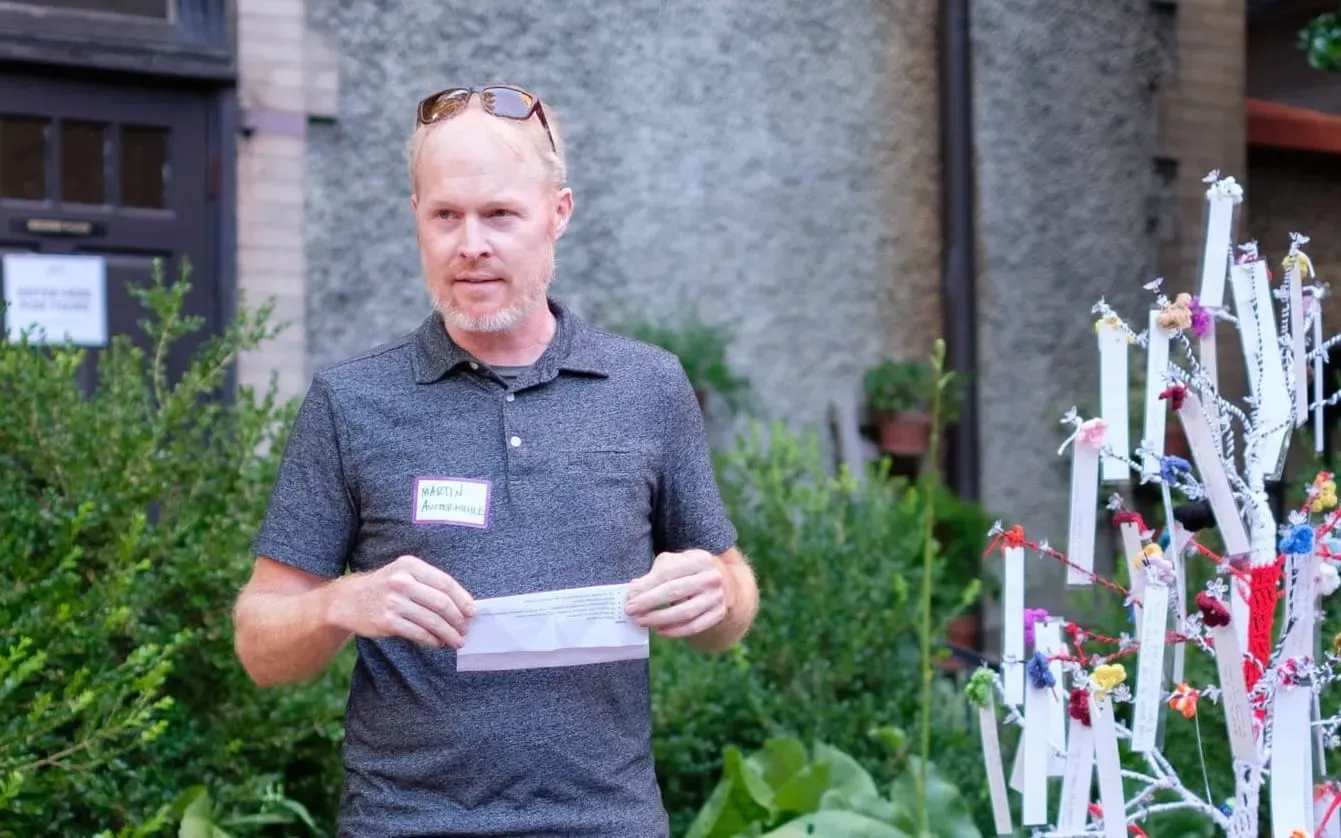 A photo of Martin Austermuhle speaking at a 51st event