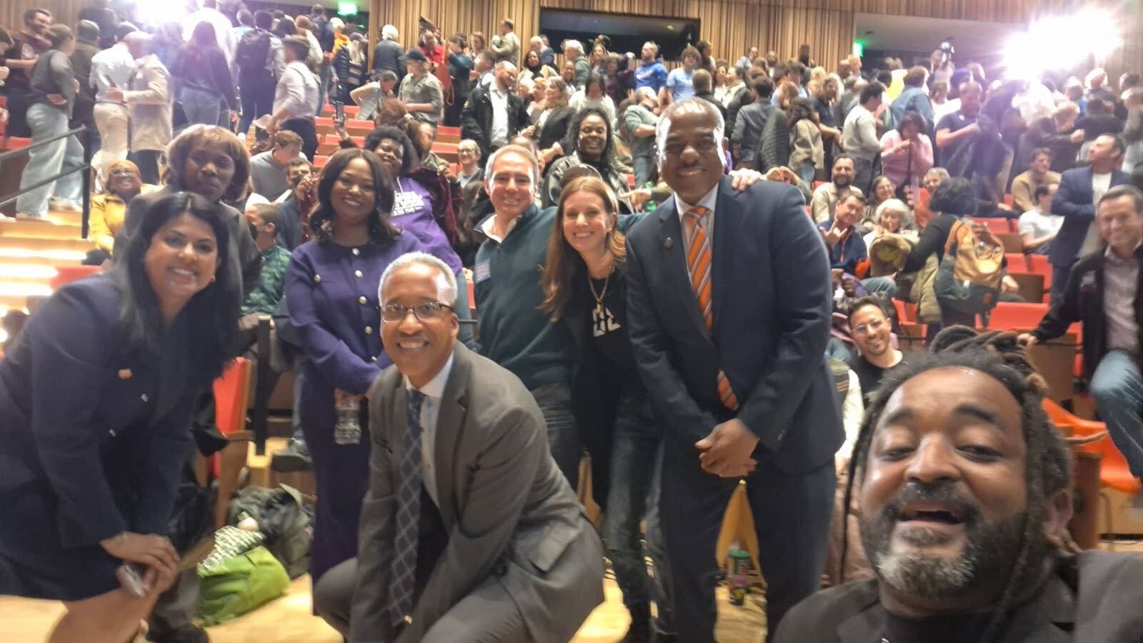 The mayoral candidates line up for a selfie with The 51st's Dwayne Lawson-Brown