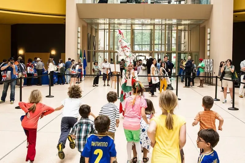 A photo of several kids in the Italian Embassy.