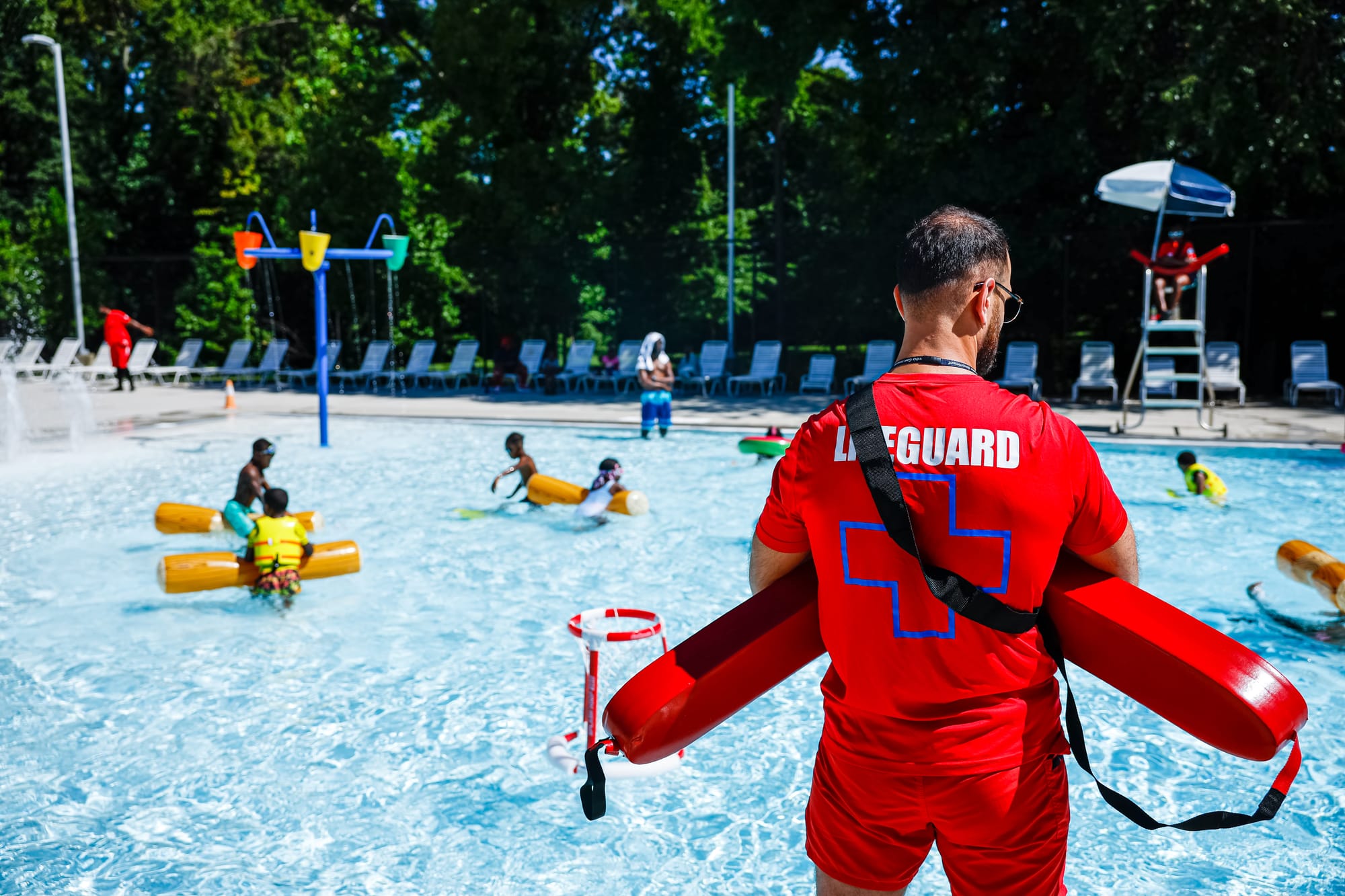 A lifeguard supervises Oxon Run Pool in Washington, D.C.