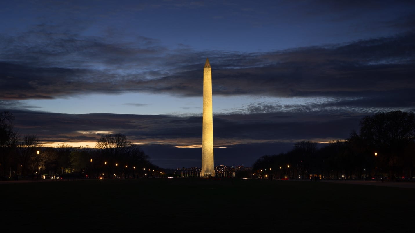 The Washington Monument at night.