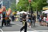 Dancers on the parade route at the 2015 Fiesta Asia Street Fair
