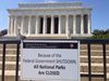 Sign at a Washington memorial about the government shutdown closing national parks.