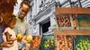 A photoshopped collage showing a family holding fresh fruit and a picture of the Wilson Building in the backgrou