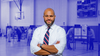 Blue photo background of people voting in DC with a photo of Robert White on top.