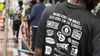 A photo of the back of a student's t-shirt, which says "More kids on bikes. Less kids on the streets."