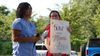 Postpartum unit nurses Mary Donaldson (left) and Ingrid Guardado-Cruz (right) spoke to crowd of community members about MedStar Washington Hospital Center's decision to cut a postpartum unit.