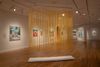 A bright-yellow sculpture, made in beeswax by D.C. artist Mary Early, hangs from a gallery ceiling at the Phillips Collection.