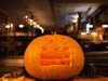 A pumpkin with the D.C. flag carved into it
