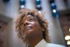D.C. artist Nekisha Durrett looks up inside her Arlington installation, Queen City.
