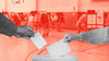 A photoshopped image of two hands putting ballots into a box with people voting on election day in a red background image.