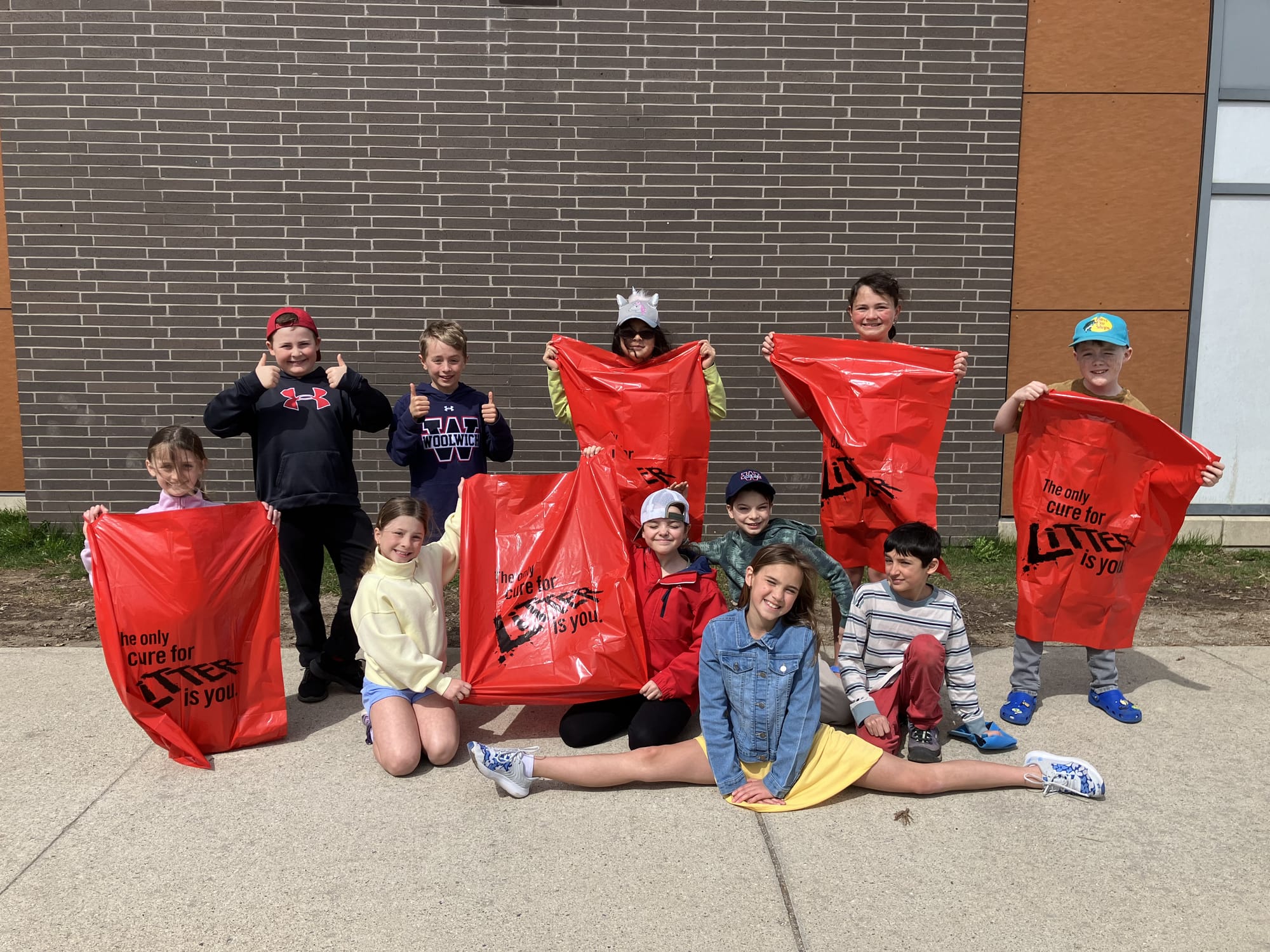 Students at two Elmira schools in friendly competition to pick up garbage around town