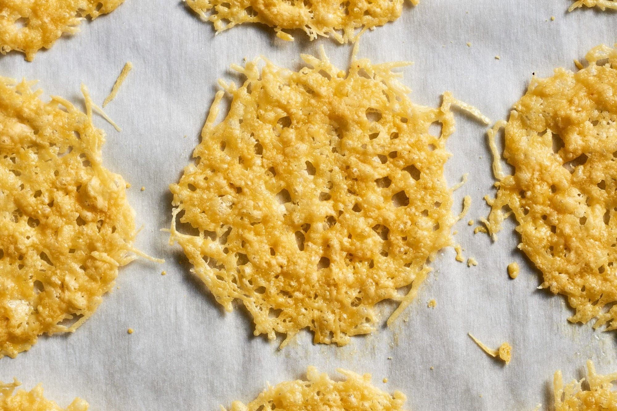 A little oven time turns Parmesan cheese into the crispiest, laciest one-ingredient cracker