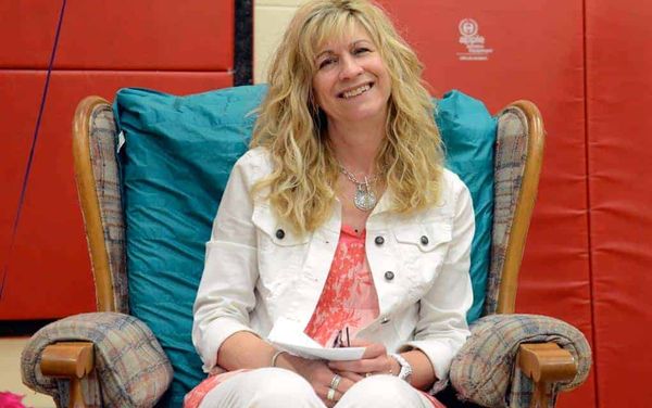 Staff, students and parents have a send-off for Jane Weber, who spent two decades at the school
