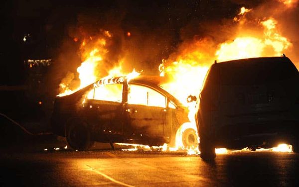 Two vehicles in flames following collision