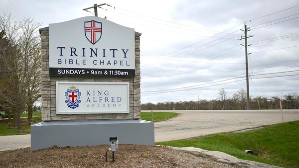 Police issue tickets as people continue to gather at Trinity Bible Chapel