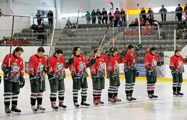 The Elmira Sugar Kings salute Austin Whittom during the team's Pink the Rink cancer fundraiser February 9 at the WMC.[Will Sloan / The Observer]