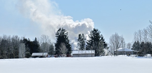 Forty firefighters spent more than eight hours Monday battling a blaze at a 19th century house between Maryhill and Conestogo.[Will Sloan / The Observer]