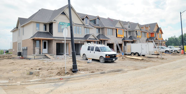 Building departments try to strike a delicate balance